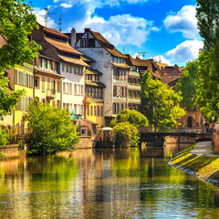 Strasbourg, water canal in Petite France area, Unesco site. Alsa - obrazy, fototapety, plakaty