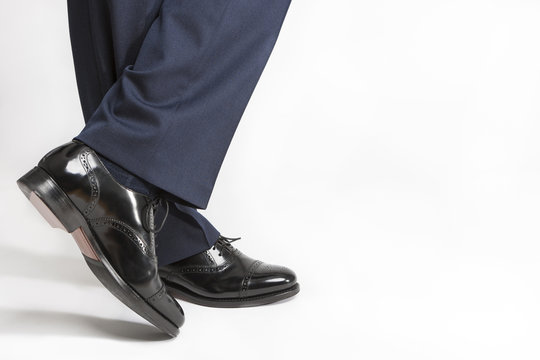 Footwear Concept: Closeup of Stylish Black Shiny Male Semi-Brogu