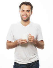 man holding white cup with coffee