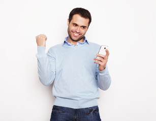 Young business man using mobile phone