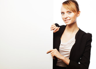  young business woman showing blank signboard