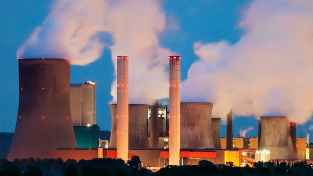 Time lapse sequence of one of the worlds largest coal-fired power stations at night with a lot of steam