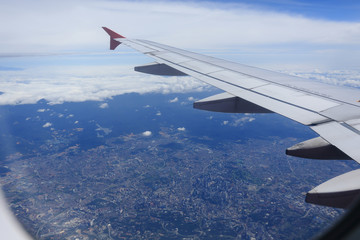 Obraz premium view from the airplane window, cloudy day