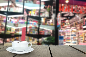 Blur background and terrace wood in front of gift shop as backgr