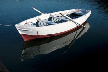 White Red Boat with water reflection