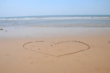 Heart drawn on the beach