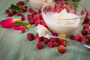 ice cream in transparent glass plates scattered around the raspb