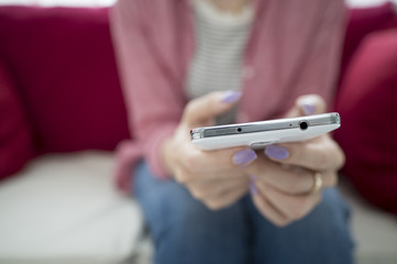 The hands of women who have a smartphone