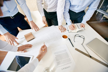 Architects discussing sketch