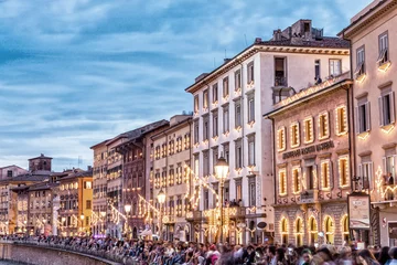 Papier Peint photo autocollant Tour de Pise PISA, ITALY - JUNE 16, 2015: Tourists and locals in Lungarni for