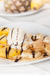 Crepes with vanilla ice cream and fruit 
