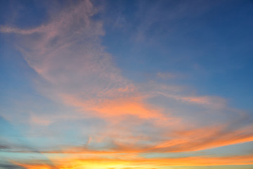 Sunset sky with orange colored clouds. 
