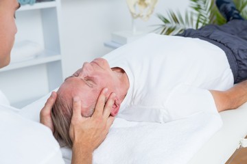 Fototapeta na wymiar Man receiving head massage 