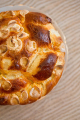 Festive baked bread on table background/Traditional food