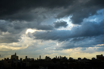 Dark blue storm clouds over city in rainy season
