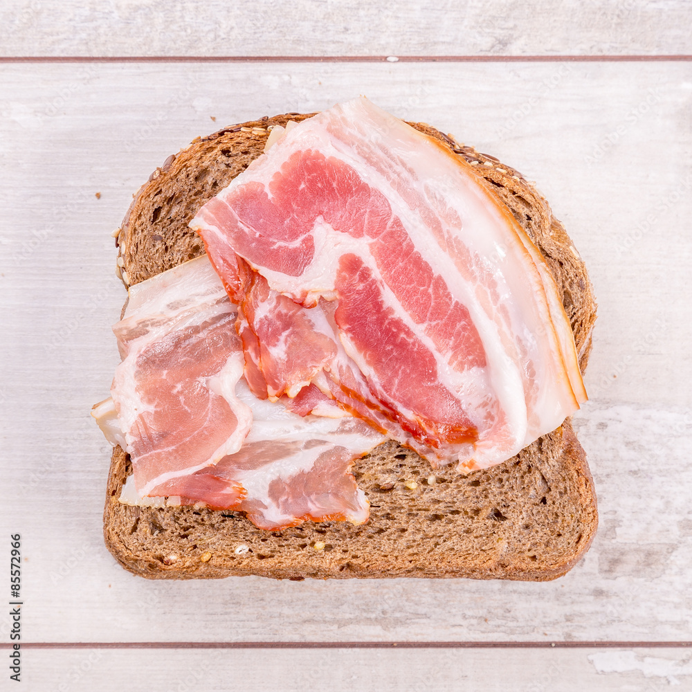 Canvas Prints Sandwich with bacon on wood background - Canvas Prints