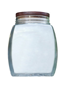 Empty glass jar with wooden lid.Isolated.