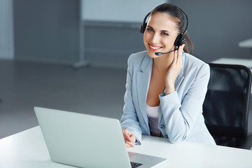 Call Center Operator Sitting Infront of Her Computer