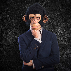 Monkey man thinking over white background