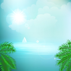 View of tropical sea between the palm trees under blue sky