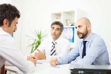 Obraz premium Business people at work in their office