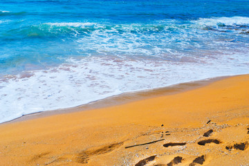 golden shore and blue sea