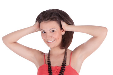 Smiling latino female in red dress posing