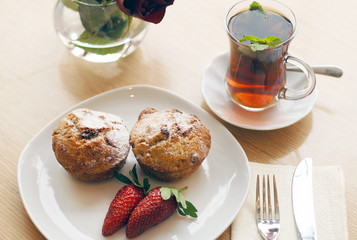 muffins served with tea