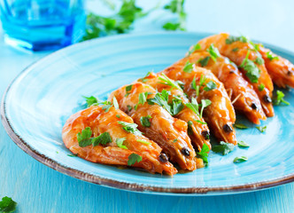 Grilled shrimp in sweet and sour sauce.