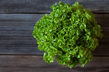 Salad lettuce natural organic vegetarian snack on vintage wooden