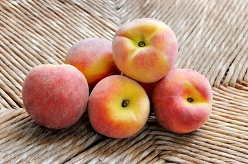Fresh peaches on natural background