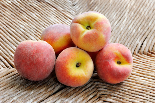 Fresh peaches on natural background