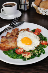 Scrambled eggs with bacon and spinach