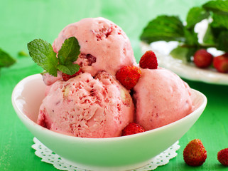 Homemade ice cream with wild strawberry.