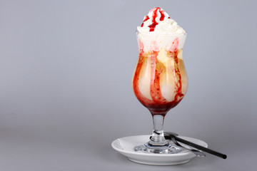 Ice cream with strawberry syrup