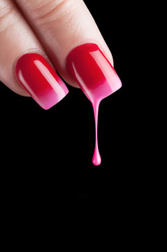 Red nail polish.