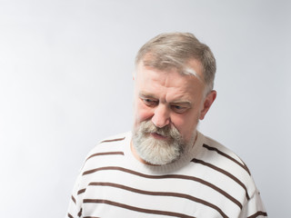 portrait of an elderly man with a beard