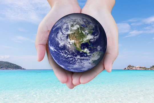 the planet among human hands in concept  Healthy oceans  healthy