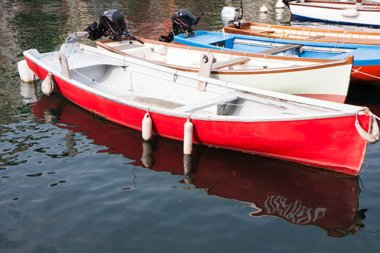 boats moored in the dock of Lake Garda