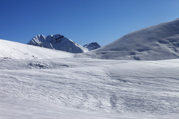 Fototapeta na wymiar Ski slope at nice sunny morning