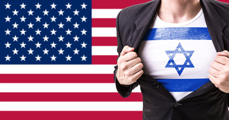 Businessman with Israel flag on american flag