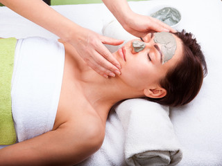 Young attractive woman getting spa treatment