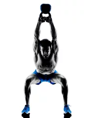 Fotobehang man exercising fitness Kettle Bell weights exercises silhouette © snaptitude