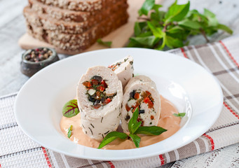 Chicken rolls stuffed with vegetables in the Greek style