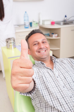 Relaxed patient on dentist chair showing like