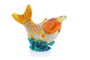 Colorful metal fancy carp have coin in mouth on white background