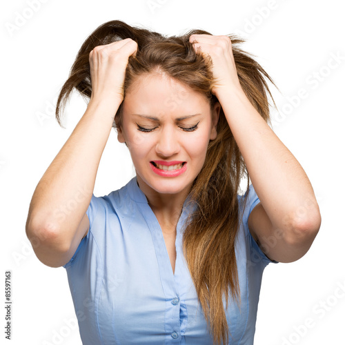 "Woman stressed is going crazy pulling her hair in frustration