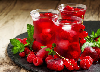 Frozen red tea with raspberries and ice in the authentic Islamic