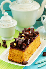 Caramel cake with chocolate decoration.