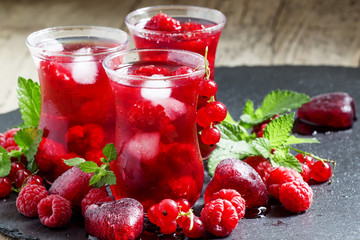 Frozen red tea with raspberries and ice in the authentic Islamic